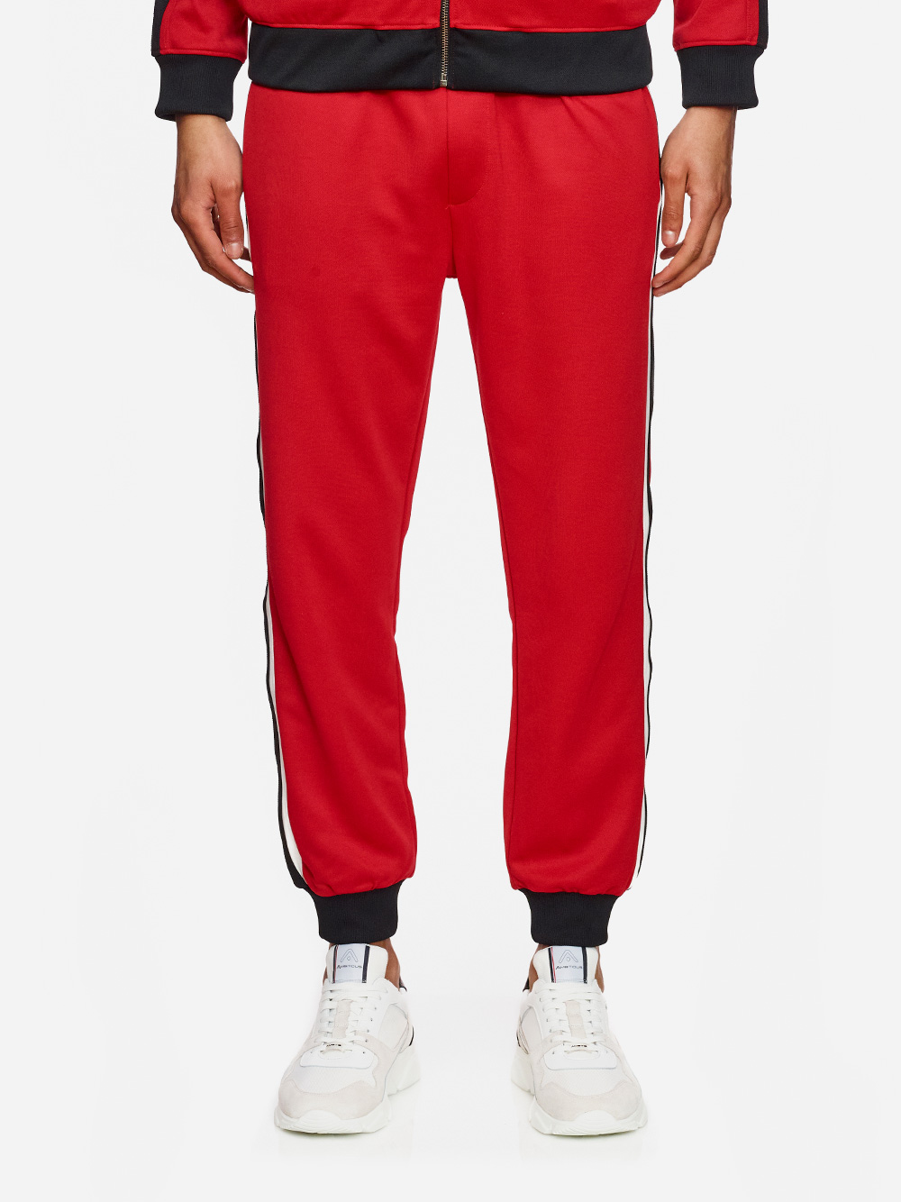 red track pants with white stripe