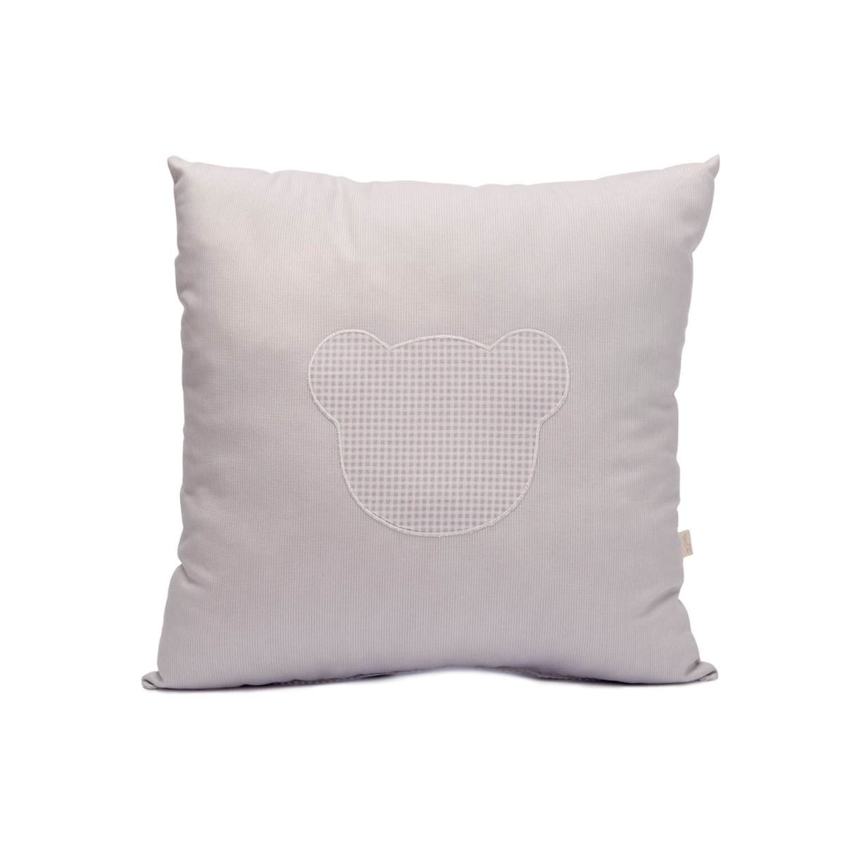 Square grey pillow with teddy bear.