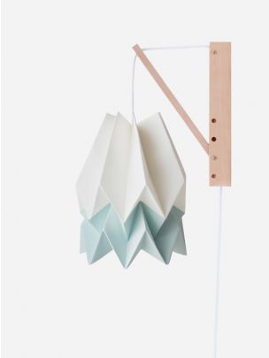 white and blue Hand-crafted origami wall lamp with wooden structure and textile cable. 